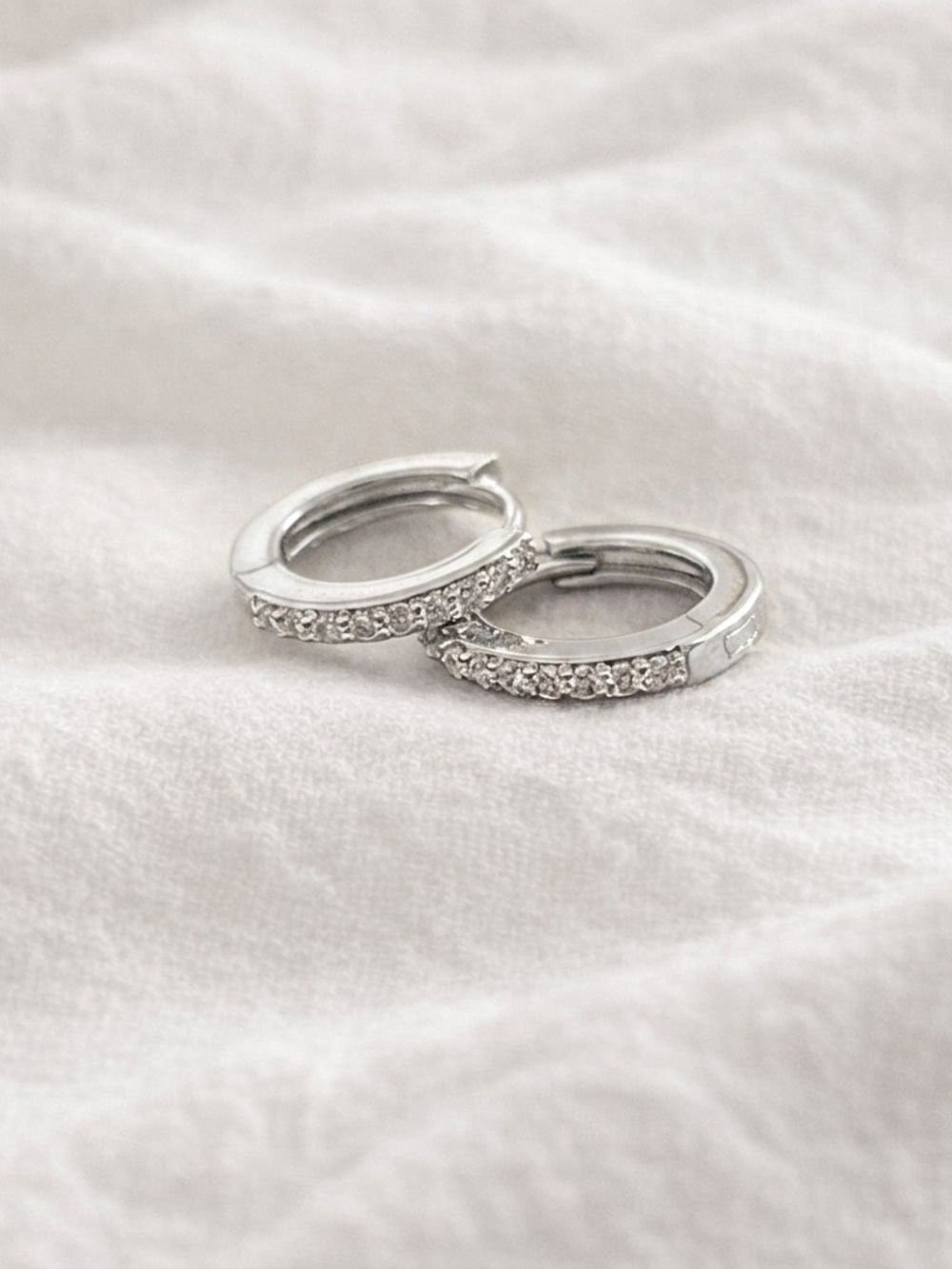 Silver plated stainless steel cubic zirconia Huggies hoop earrings